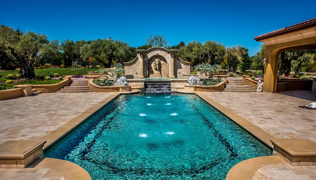 French pattern travertine pool edge example